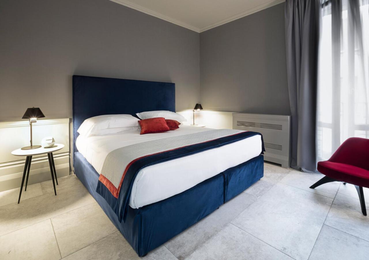 ホテル パラッツォ コーナリア ミラノ エクステリア 写真 A bedroom at the hotel