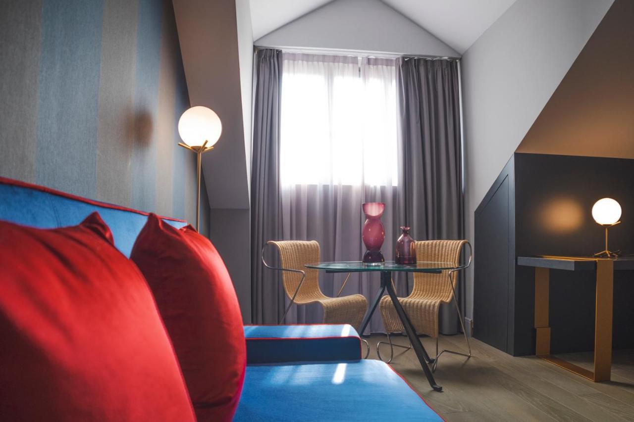 ホテル パラッツォ コーナリア ミラノ エクステリア 写真 A room at the hotel