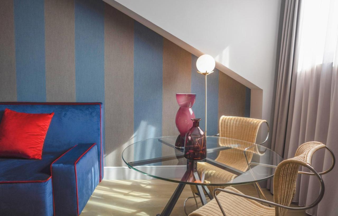 ホテル パラッツォ コーナリア ミラノ エクステリア 写真 A room at the hotel