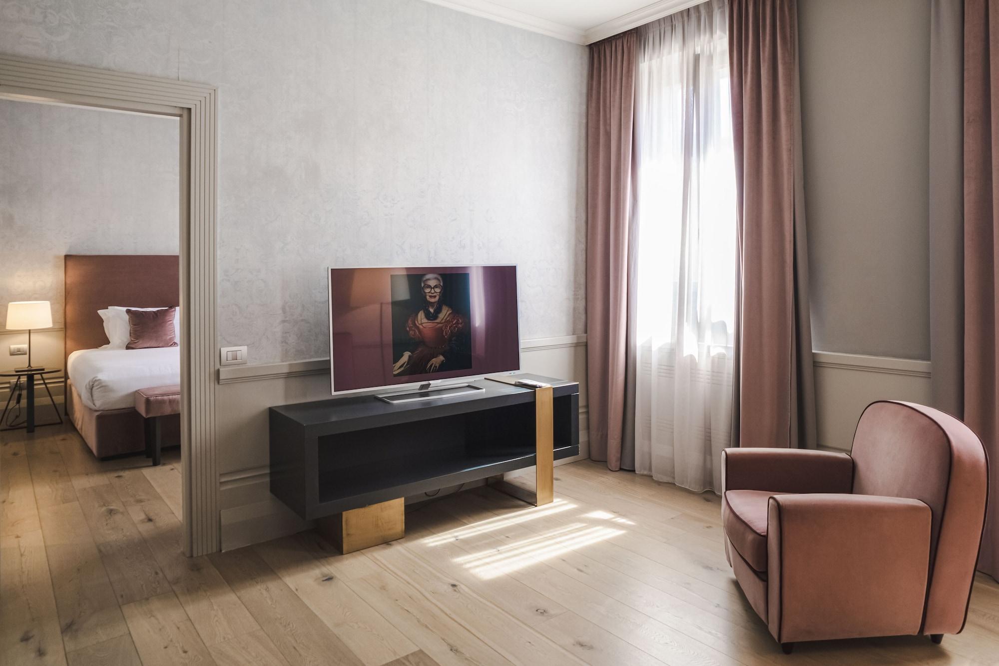 ホテル パラッツォ コーナリア ミラノ エクステリア 写真 A suite at the hotel
