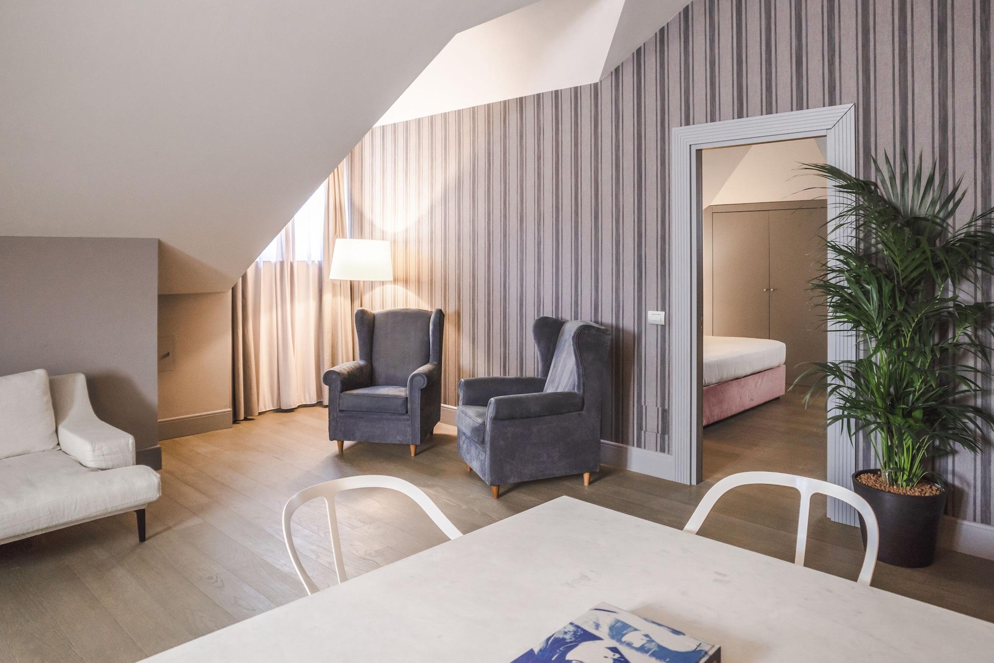 ホテル パラッツォ コーナリア ミラノ エクステリア 写真 A suite at the hotel