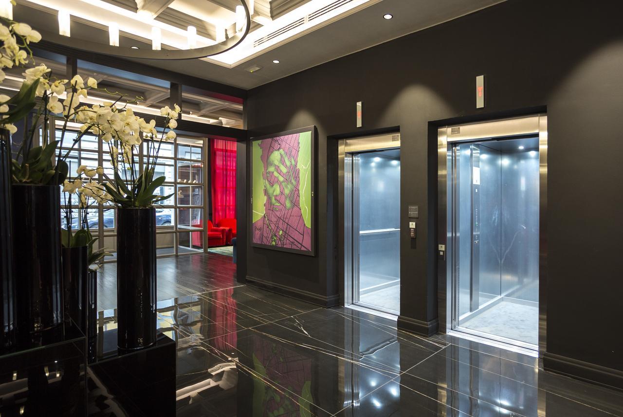 ホテル パラッツォ コーナリア ミラノ エクステリア 写真 Elevators in a hotel