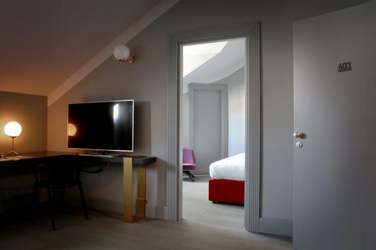 ホテル パラッツォ コーナリア ミラノ エクステリア 写真 A room at the hotel