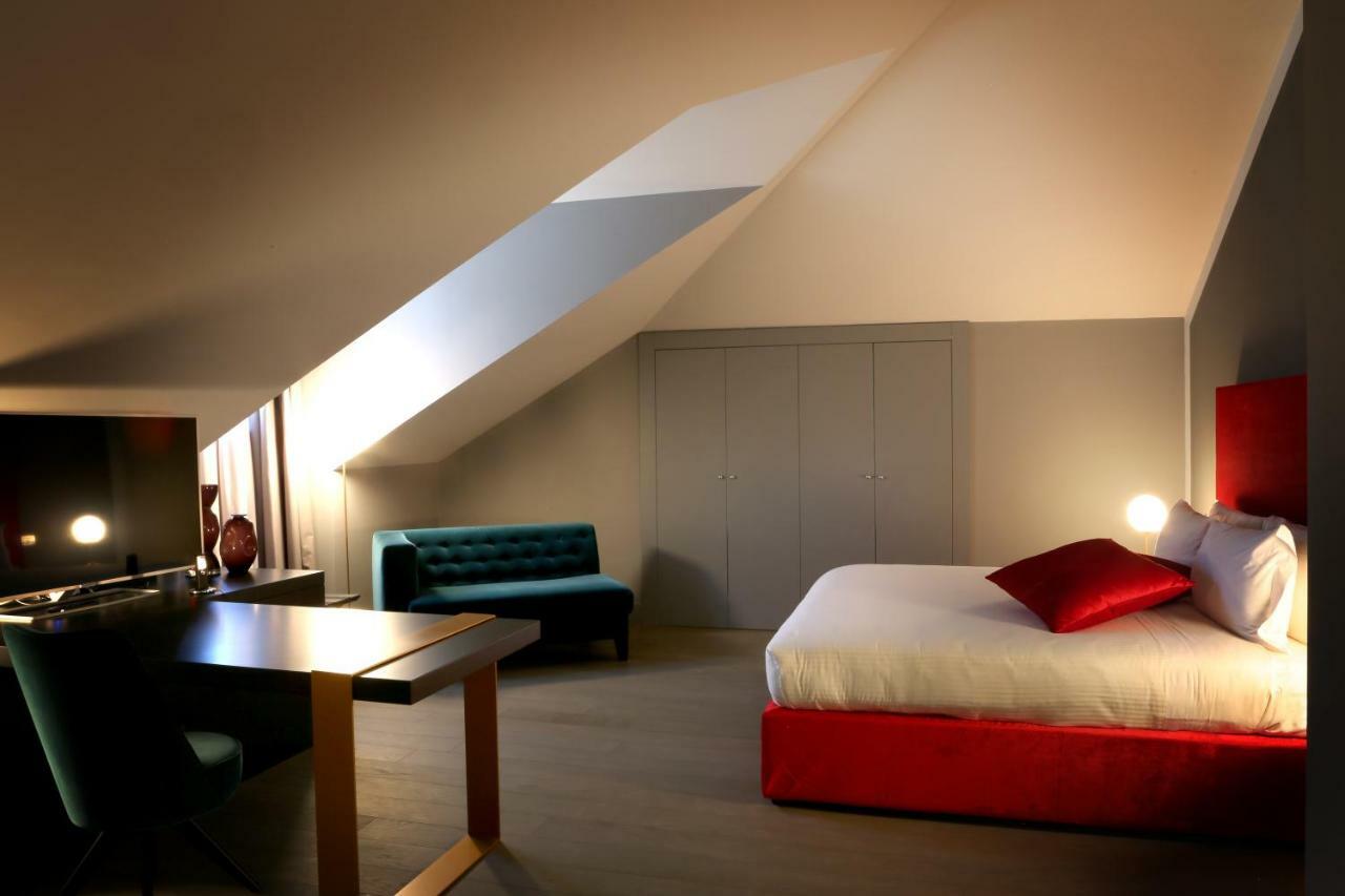 ホテル パラッツォ コーナリア ミラノ エクステリア 写真 A room at the hotel